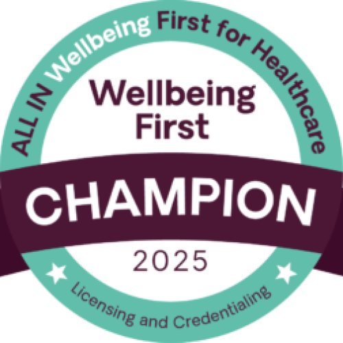 Allin25 Wellbeingfirstchampionbadge 2025 White 300x252png