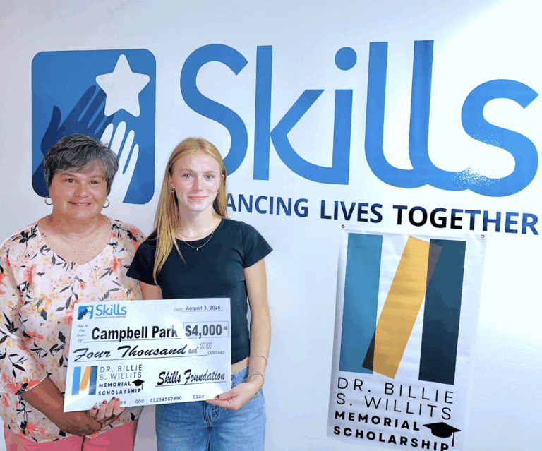 Skills of Central PA CEO Val Barner (left) presents Ross (right) with $4,000 toward her freshman year at PSU.